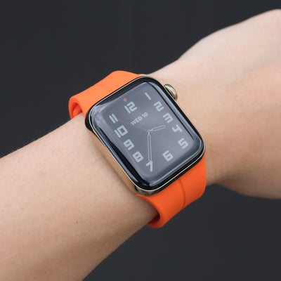 Pin and Buckle - Sport Flex Apple Watch Band - Tangerine - on Wrist